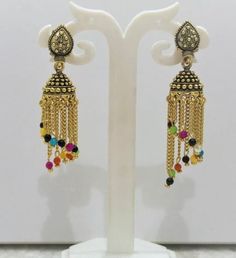 This Unique pair of Earrings is designed and crafted at PraNiCollectioNs  PraNiCollectioNs is the place for anyone who Is in lookout for a latest trend with an ethnic touch.  We at PraNiCollectioNs offers a great range of Indian Ethnic jewellery's. We are strongly committed to  providing our customers  some uniquely handcrafted products with utmost satisfaction. These jewellery's are made from high quality  material which are Hypoallergenic and are also free from corrosion and rusting This listi Jumka Earrings, Earrings Indian, Rainbow Beads, Indian Earrings, Latest Trend, Ethnic Jewelry, Earrings Boho, Gold Hoops, Boho Earrings