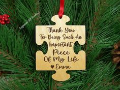 a wooden ornament hanging from a christmas tree with the words thank you for being such an important piece of my life