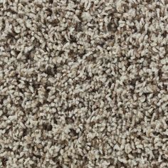 the texture of carpet is brown and white