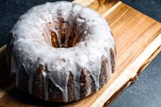 a bundt cake sitting on top of a wooden cutting board