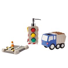 a toy truck and traffic light next to each other