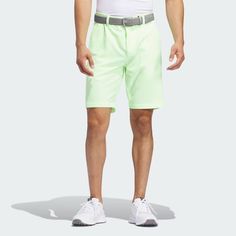 Built for the detailed-oriented golfer who looks for a competitive edge, these adidas golf shorts are made with a soft and breathable four-way stretch fabric that moves with you as you swing. They also have a water-repellent finish that sheds light showers and dew to keep you focused on your game, not the elements. Athleisure Stretch Bottoms For Golf, Stretch Athleisure Bottoms For Golf, Spring Training Activewear With Three Stripes, Spring Adidas Moisture-wicking Bottoms, Green Adidas Sporty Activewear, Fitted Athleisure Bottoms For Golf, Moisture-wicking Stretch Golf Bottoms, Stretch Moisture-wicking Golf Bottoms, Green Sports Bottoms For Sports Season