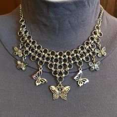 In Many Ancient Cultures, Butterflies Were Believed To Be Symbolic Of The Transformation And Rebirth Of The Soul. In Ancient Greek Mythology, The Goddess Psyche, Who Represented The Soul, Was Frequently Depicted With Butterfly Wings. In Ancient Egyptian Mythology, Butterflies Symbolized The Soul’s Journey Through The Afterlife. Whether You Love The Symbolism Of Butterflies Throughout The Ages, Or You Simply Want A Necklace That Is A Fierce Gothic Piece But Still Has Classically Feminine Touches, Silver Butterfly Necklace With Metal Chain, Silver Butterfly Necklace With Chain, Silver Metal Butterfly Necklace, Butterfly Charm Metal Necklace For Party, Silver Butterfly Necklace For Party, Butterfly Shaped Metal Necklaces For Parties, Metal Butterfly Necklace For Parties, Metal Butterfly Necklace With Adjustable Chain, Metal Butterfly Charm Necklace For Party