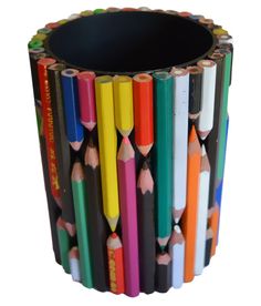 several colored pencils are arranged in the shape of a cup