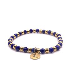 Blue Lapis Lazuli and Gold Beaded Stretch Bracelet Accented with 18K gold filled 4mm beads 4mm deep blue lapis beads Every bracelet I design is carefully thought out and crafted. Each individual bead is selected for its color, vibrancy, and size. I pay careful attention to how each bracelet lays on the wrist, how they nestle together as a stack, and how comfortable they are to wear together and individually. size: small 6.5" - 7"size: med 7" - 7.5" Gold Charm Bracelet With Gemstone Round Beads, Gold Beaded Lapis Lazuli Bracelets, Gold Lapis Lazuli Bracelets For Gift, Gold Lapis Lazuli Beaded Bracelets With Round Beads, Hand-strung Gold Lapis Lazuli Bracelets, Gold Lapis Lazuli Spiritual Bracelets, Lapis Lazuli Blue, Lapis Jewelry, Lincoln Nebraska