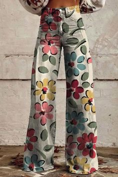 Introducing our Women's Multicolor Flowers Print Casual Wide Leg Pants. These pants feature a vibrant floral print that adds a pop of color to your outfit. With their wide-leg design, they offer both comfort and style, perfect for casual occasions. Embrace playful elegance with these eye-catching pants. Multicolor Full-length Jeans For Summer, Multicolor Full Length Jeans For Summer, Multicolor Full-length Jeans For Spring, Casual Multicolor Full-length Jeans, Multicolor Full Length Jeans For Spring, Spring Multicolor Full-length Jeans, Multicolor Full-length Jeans With Pockets, Multicolor Baggy High Waist Pants, Baggy High Waist Multicolor Bottoms