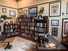 a room filled with lots of books and pictures