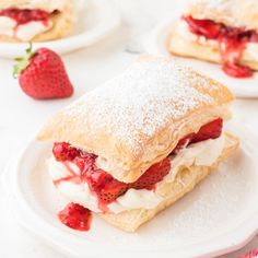 strawberry short sandwiches with powdered sugar and strawberries