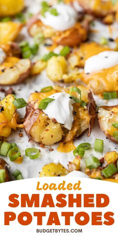 loaded smashed potatoes with green onions and sour cream on top are the perfect appetizer for any party