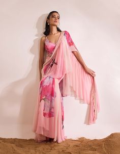 Emanate charm for the opulence of modern celebrations with Fiona sari set. Featuring a floral printed sari with refined draping and delicate embellishments, paired exquisitely with a sparkling sequinned blouse detailed with tassels. Indian Couture, Modern Vibe, Print Chiffon, Floral Printed, Lehenga, Classic Design, Tassels, Embellishments, Personal Style