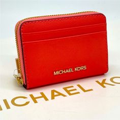 Nwt Michael Kors Medium Zip Around Coin Holder Red Bifold Bag With Zipper Closure, Michael Kors Wallets With Card Slots For Gift, Modern Red Bags With Card Slots, Red Coin Purse With Interior Card Slots For Travel, Red Coin Purse With Card Slots For Travel, Michael Kors Red Bag With Removable Pouch, Red Rectangular Coin Purse With Interior Card Slots, Red Coin Purse With Card Slots, Leather Credit Card Wallet