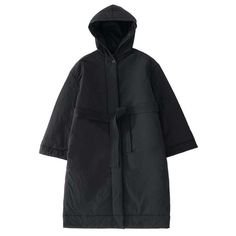 The kariba coat is constructed from a powder-coated parachute nylon and filled with ecodown fibres for superior heat retention. its design diverges from typical down jackets in the inclusion of a hood and a belt the latter adding shape to its voluminous silhouette. features a concealed front placket and pockets on side seams powder finish parachute nylon with ecodown filling. generous oversized fit.  made by studio nicholson  content & care: shell: 100% polyamide filling: 100% recycled polyester lining: 95% polyester 5% elastane / dry clean only  measurements: emmanuelle is 5’10” / 178cm she wears a size us 4/ uk 8 Winter Workwear Nylon Raincoat, Oversized Nylon Raincoat For Winter, Overalls And Sweater, Overall Jumper, Metallic Loafers, Studio Nicholson, Down Jackets, Womens Size Chart, Engineered Garments