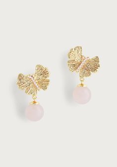 Featuring 18k gold dipped brass, polished light pink quartz, and hand set pavé crystals, these artfully sculpted pieces elevate any occasion. The earrings feature sculpted, bejeweled butterflies with tiny feminine quartz drops, adding timeless glamour to your jewelry wardrobe and making them the perfect accessory, no matter the occasion. Rose Quartz Crystals 18k gold plated brass 0.7" L X 0.5" W Real Butterflies, Ginkgo Leaves, Jewelry Wardrobe, Delicate Beauty, Butterfly Jewelry, Gold Dipped, Rose Quartz Crystal, Pink Quartz, Drop Earring