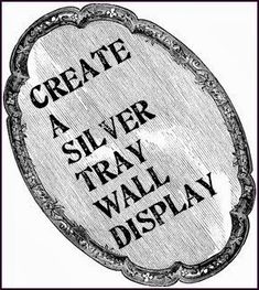 a sign that says create silver tray wall display with an oval frame in the center