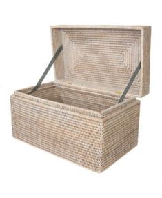 an empty wicker storage box with handles