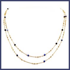 Two delicate golden chains are enhanced by tiny faceted beads of deep blue sodalite. 16" long with a 3" extender Handmade in Thailand and imported by Nakamol Chicago Elegant Blue Crystal Necklaces With Adjustable Chain, Elegant Blue Crystal Necklace With Adjustable Chain, Elegant Blue Necklace With Satellite Chain, Elegant Blue Beaded Necklace With Adjustable Chain, Blue Adjustable Gold-plated Chain Necklace, Blue Adjustable Gold Plated Chain Necklace, Blue Gold-plated Chain Necklace With Adjustable Chain, Dainty Blue Necklaces With Satellite Chain, Dainty Blue Necklace With Satellite Chain