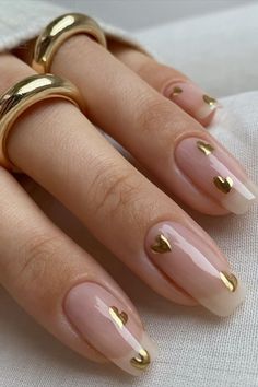 Drippin' in GOLD✨🤍 Catch us asking for this mani when the nail salons reopen! We are OBSESSED with these gold heart nails by @tiffanyabbigailebeauty✨ Heart Nails, روتين العناية بالبشرة, Classy Nails, Valentine's Day Nails, Valentines Nails, Cute Acrylic Nails