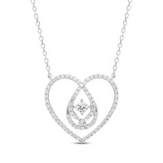 From the Love Entwined collection, this diamond heart necklace shimmers with your affection. Crafted in 10K white gold The looping heart is lined with round-cut diamonds and reveals a larger round-cut diamond at its center Total diamond weight of the pair is 1/3 carat The 16-inch necklace with 2-inch extender secures with a lobster clasp Diamond Heart Necklace, 16 Inch Necklace, Heart Necklace Diamond, Accessories Jewelry Necklace, 3 Carat, 2 Carat, Diamond Heart, Round Cut Diamond, Cable Chain