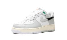 The Nike Air Force 1 Low “Split - Light Silver” is a colorway of the retro basketball shoe that features a split-colored Swoosh.  A modern take on the legendary Air Force 1 Low, the “Split - Light Silver” has a two-tone, grey-and-black Swoosh logo on the side.  The upper is complete with a white leather base with grey leather overlay panels.  The tongue and heel Nike logos also feature a “split” design that each combines two different logos into one.  Below the cream-white midsole, a split grey Nike Logos, Split Lighting, Retro Basketball Shoes, Retro Basketball, Split Design, Nike Air Force 1 Low, Stadium Goods, Swoosh Logo, Air Force 1 Low