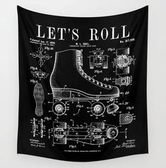 a black and white wall hanging with an image of roller skates on it's side