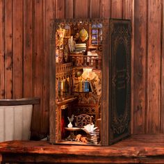 an open book case sitting on top of a wooden table