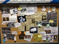 a bulletin board covered in papers and pictures