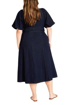 Elevate your office-casual look in this denim midi designed with a belted waist and airy flutter sleeves. 47" length Hidden back-zip closure V-neck Short sleeves Removable belt Unlined 100% cotton Machine wash, line dry Imported Chic Belted Knee-length Denim Dress, Chic Knee-length Belted Denim Dress, Belted Knee-length Denim Dress, Short Sleeve Belted Denim Workwear Dress, Chic Medium Wash Belted Denim Dress, Denim Midi Dress With Short Sleeves For Work, Belted Denim Dress With Short Sleeves For Work, Casual Flutter Sleeve Midi Dress For Work, Casual Midi Dress With Flutter Sleeves For Work