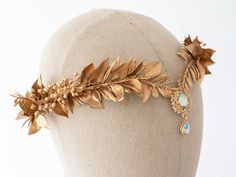 A whimsical elven fairy crown in beautiful tones of gold. Thanks to the use of artificial leaves, the crown is durable. It is a special touch to your bohemian look. Head circumference: one size fits all (adjustable) / fits adults and older children If the crown should fit the baby, after buying please give head circumference We offer customized accessories, matching the floral crown. Here you can buy a matching floral boutonniere: https://www.etsy.com/listing/672949700/customized-flower-boutonni Golden Flower Crown, Elven Hair Accessories, Norse Crown, Gold Fairy Dress, Golden Leaf Crown, Elvish Crown, Autumn Crown, Fantasy Crowns, Leaves Crown