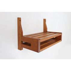 a wooden shelf with two shelves attached to it