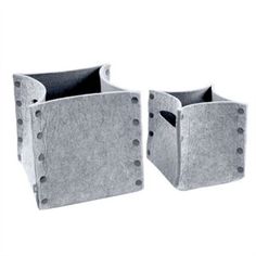 pair of grey fabric storage bins with rivet holes