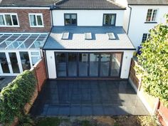 an aerial view of a house with many windows