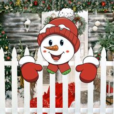 a snowman is standing behind a white picket fence