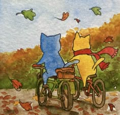 two cats are riding on the back of a bicycle in autumn leaves and falling from trees