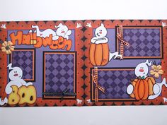 an orange and purple halloween themed scrapbook cover