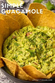 a bowl filled with guacamole and tortilla chips