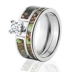 a wedding ring with moss inlays and a princess cut diamond