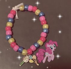 a little pony bracelet with a key charm