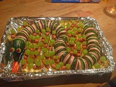 a tray filled with lots of food on top of a table