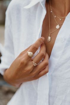 less is more with this simlpe gold stacking ring look. layered to perfection with a single statement signet ring. mixed in with a rose cut diamond ring and diamond crown ring to frame the look. a raw and refined gold jewelry stack made with your story in mind. Diamond Crown Ring, Jewelry Stack, Rose Cut Diamond Ring, Gold Stacking Ring, Diamond Signet Ring, Jordan Jewelry