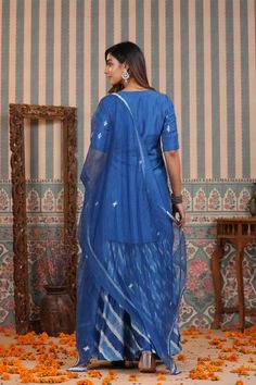 Be a vision in our Blue Tie And Dye Sharara Suit Set. Crafted in cooling blue hues of muslin featuring a unique tie and dye design, this lovely suit set is the perfect choice for summer weddings and festive occasions. The set is complete with an airy organza dupatta to add a touch of harmony to the ensemble. No. of pieces - 3 piece set. Color - Blue. Fabric - Muslin. Washing Instructions - Dry Clean. Sharara Suit, Unique Ties, Organza Dupatta, Summer Weddings, Tie And Dye, Blue Tie, Suit Set, Womens Size Chart, Blue Ties