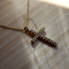 May you shine with this cross necklace. * Made in California, USA * Made to order - PENDANT SIZE * Height: 0.82in (20.83 mm) * Width: 0.55in (14.09mm) - DIAMOND * 16 diamonds: 0.32 Ct * Clarity: VS1 - 2 * Color: F - G Color * Cut: Brilliant Cut * Stone Size: 1.7mm (the stone may be slightly small or bigger than 1.7mm) - GOLD * 14kt gold * please choose from yellow, white or rose gold - CHAIN * 14kt Gold Oval Link 030 lobster clasp Diamond Cross Pendant Necklace With Single Cut Diamonds, Cross Necklace With Single Cut Diamonds, Gold Cross Pendant Diamond Necklace With Single Cut, Gold Diamond Cross Pendant Necklace With Single Cut Diamonds, Gold Diamond Necklace With Cross Pendant, Diamond Accented Cross Necklace, Brilliant Cut Cross Necklace As Gift, Gold Brilliant Cut Diamond Cross Pendant Necklace, Gold Brilliant Cut Diamond Necklace With Cross Pendant