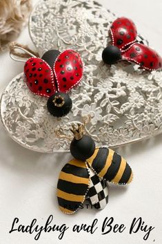 two ladybugs and a bee on a lace doily