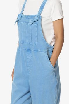 Embrace everyday chic with these denim overalls that blend utility and style. Their adjustable straps and relaxed fit ensure all-day comfort, perfect for casual outings.Made with a soft cotton blend and durable twill, these versatile one-piece jumpsuits are a wardrobe staple for any season.The cropped tapered legs and bib pocket add a contemporary touch to the timeless design, while slant pockets merge convenience with streetwear vibes.Ideal for casual travel, weekend wear, or special occasions, Spring Utility Denim Jumpsuit With Side Pockets, Utility Style Washed Denim Jumpsuit, Utility Washed Overalls Jumpsuit, Spring Denim Overalls In Solid Color, Relaxed Fit Medium Wash Overalls With Adjustable Straps, Relaxed Fit Utility Shortalls With Pockets, Utility Style Relaxed Fit Shortalls With Pockets, Utility Style Shortalls With Pockets And Relaxed Fit, Everyday Bib Front Overalls With Pockets