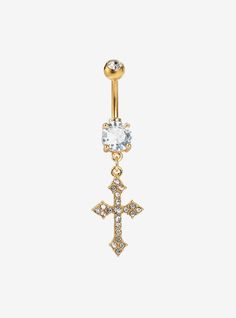 a gold navel with an aqua blue crystal cross on it