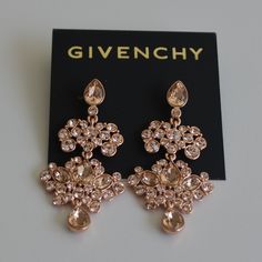 New With Tags! *Rose Goldtone Metal *Chandelier Earrings *Stone Accents *Post Back Closure *About 2.1/8" Drop Rose Gold Chandelier, Givenchy Earrings, Givenchy Jewelry, Monogram Earrings, Gray Earrings, Earrings Stone, Metal Chandelier, Crystal Dangle Earrings, Purple Earrings