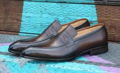 Style: 478-503-Chestnut Stylish Hand Burnished Calfskin slip-on Penny Loafer from the Carrucci collection features soft Calfskin linings and a clean welt Classic Brown Slip-ons For Fall, Business Brown Slip-ons With Leather Lining, Brown Goodyear Welted Slip-on Leather Shoes, Brown Semi-formal Slip-ons With Rubber Sole, Brown Slip-on Tassel Loafers With Leather Lining, Brown Tassel Slip-on Loafers With Leather Lining, Elegant Brown Moccasins With Stitched Sole, Classic Brown Slip-ons, Elegant Brown Moccasins With Moc Toe