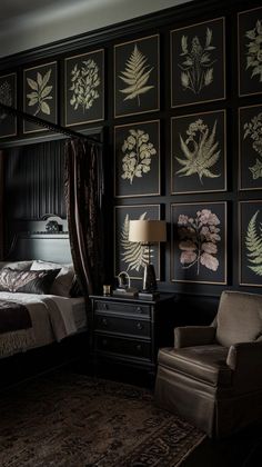 a bed room with a neatly made bed next to a night stand and chair in front of it