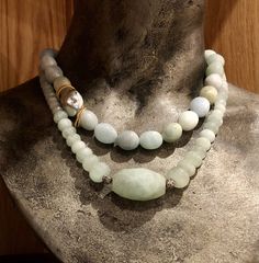 "This is a stunning trio of statement necklaces. Pale green jade gemstones necklace, worn together with egg shaped milky aquamarine stones and sliced milky aquamarine stones. All these create a stunning combination and a bohemian look. This necklaces can be worn together or separately and will work for everyday or with an evening dress. Each necklace can be purchased separately for $240 usd. Dimensions: length - 17\" - 19\" (including clasp) extender- can be added by request *If, for any reason, Handmade Elegant Amazonite Necklace, Elegant Amazonite Gemstone Beaded Necklace, Elegant Amazonite Beaded Necklaces With Natural Stones, Elegant Amazonite Beaded Necklace With Natural Stones, Luxury Handmade Jade Necklace, Elegant Chrysoprase Gemstone Beads Necklaces, Elegant Chrysoprase Gemstone Beads Necklace, Necklaces Green, Green Jade Necklace