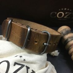 "At Cozy Handmade, we pride ourselves on using the highest quality materials for our products. This 3-Ring style single pass-through watch strap is made of premium full grain Italian veg tanned leather from one of the best tanneries in Italy. The leather features a gorgeous texture with natural characteristics which will give your timepiece an instant rugged and vintage stylish look. Its appearance will get even better with time as it acquires patina, wrinkles and marks. This watch strap is stit Vintage Brown Watch Bands With Waxed Finish, Vintage Leather Strap Watch Bands For Everyday Use, Classic Watch Bands With Waxed Finish For Everyday Use, Everyday Leather Bracelet With Waxed Finish, Rugged Leather Watch Bands For Everyday Use, Rugged Leather Strap Watch Accessories, Vintage Leather Strap Watch Accessories For Everyday Use, Vintage Leather Watch Accessories For Everyday Use, Vintage Leather Strap Watch Accessories