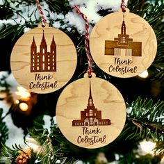 three wooden ornaments hanging from a tree with the words thank, celebrate and think christmas written on them